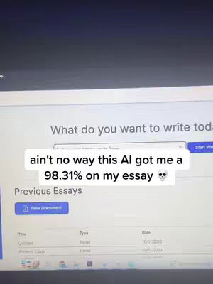 A screenshot of a laptop screen displaying an AI writing tool interface. A text overlay includes the message and a skull emoji.