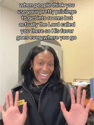 A woman with dark hair is smiling widely, her hands held out with palms facing the viewer. Text overlays the image, and the background suggests an interior office setting.