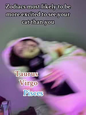 A blurry image with overlying text. A person is seen wrapped in a white blanket, possibly lying down. The text overlay indicates a list about zodiac signs and cats. The colors are dominantly soft, with potential use of selective focus to draw attention to the text and the person.