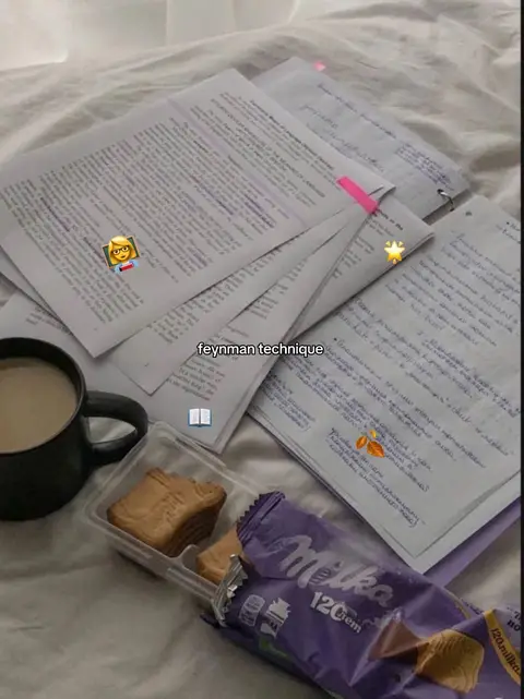 The image shows a cozy study setup on a bed, with papers, a coffee mug, cookies, and a chocolate bar, decorated with stickers indicating study. The layout is casual.