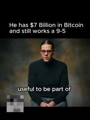 The cover image features a man wearing glasses and a dark turtleneck sweater, seated in front of a blurred dark background. White text overlays the image, highlighting key information about the subject, accompanied by a pixelated character.