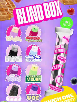 The cover image is a promotional graphic with a vibrant, playful layout. It features a purple background. The central focus is a silver toothpaste tube, with several flavors of toothpaste presented as small, colorful, oval-shaped images surrounding it. These images present flavors such as waffles, black ice, white chocolate, cherry limeade, very berry, honeydew melon, and UBE. The central toothpaste tube has text elements with the words tasty and fun. Above the main element, there is a waffle, adding a food-related element. In the top right corner, there is a green circle with "LIVE NOW" written on it.