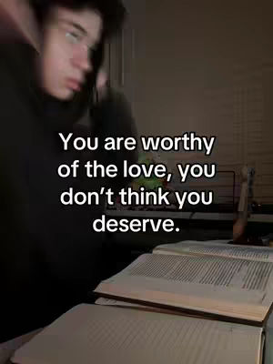 The cover image shows a person looking at text on a page with text overlaid. The person is silhouetted and slightly blurred for effect. The text is in white, contrasted against the medium-lit background.