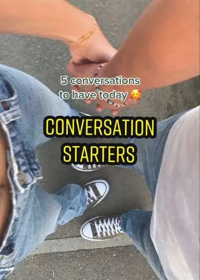 The cover image shows two people holding hands, with the view looking down at their hands and legs. Their shoes are visible. Overlaid text invites viewers to engage with conversation starters.