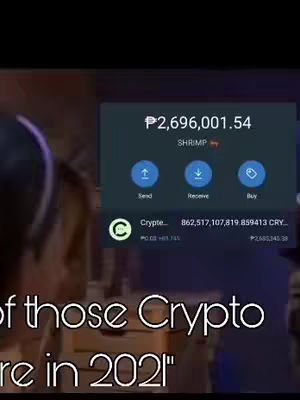 The cover image features a blurred background with a focus on a portion of a person's face. Overlaid on the image is a display showing fiat money along with the name 'SHRIMP'. Below the top-right corner a box is presenting the balance plus three action buttons, labeled 'Send', 'Receive', and 'Buy'. There's also the logo of a crypto-platform showing the amount of available cryptocurrency. The image has overlaid text at the bottom.