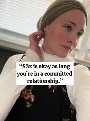 A selfie-style shot featuring a woman in the foreground with a soft appearance. She is positioned slightly off-center, head and shoulders visible, wearing a head covering and a top with floral patterns. A text overlay with a quote is present.