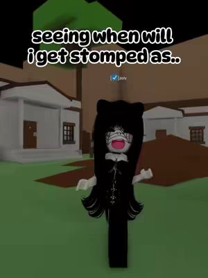 The cover image shows a Roblox avatar in a dark setting, likely a game environment. The avatar is a female figure with long black hair with cat ears, and a black dress. The avatar has bandages on her face with her mouth open showing an expression of surprise or fear. Above the avatar, there is white text. The background features buildings and green ground.