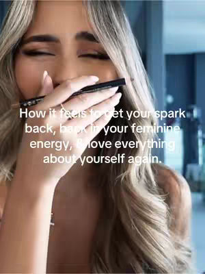 A close-up shot features a person with long, wavy blonde hair, partially obscuring their face. They hold a dark eyeliner pencil up to their face, with their eyes closed and a pensive expression. Text overlays the image, conveying a message about finding inner strength and self-love.