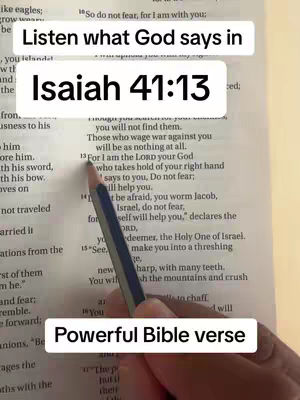 A hand holding a pencil points to a highlighted bible verse on a page. Overlaid are white boxes with the text: "Listen what God says in", "Isaiah 41:13", and "Powerful Bible verse". The background is the bible page.