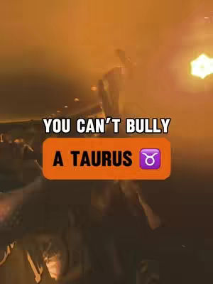 The cover image features a dimly lit background with an orange glow, possibly indicating a sunset or artificial lighting. The foreground displays text overlays over a blurry image of a person. The text is arranged to make a strong statement. There's also a zodiac symbol of the Taurus on the overlay.
