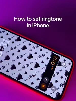 The image shows a phone with a screen displaying paw prints and hearts, and a control panel in the bottom right corner. The background has a mix of purple and pink gradients. Text overlayed in the top reads How to set ringtone in iPhone.