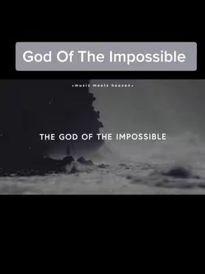 The image features a dramatic, landscape-like scene with dark hues. A gray rectangular overlay at the top contains the text "God Of The Impossible" written in a white, sans-serif font. Below this, the scene reveals a dark silhouette on the left and what appears to be a cloudy or misty sky dominating the rest of the image. The text "THE GOD OF THE IMPOSSIBLE" is centered. These elements, set against a dark backdrop, create a somber yet inspiring effect.