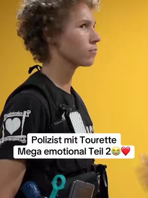 A young man in a police uniform stands in profile against a yellow background. The man has short, curly, light-colored hair and is wearing a black uniform with a badge and equipment. Overlay text in a white box at the bottom of the frame identifies the video theme.