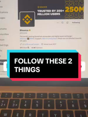 A screenshot of the Binance Twitter profile on a laptop screen. The cover image is overlaid with a colored rectangular box that contains the text 'FOLLOW THESE 2 THINGS.' A keyboard is visible in the foreground.
