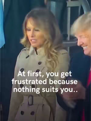 The image shows a woman in a beige trench coat speaking. The text overlay reads: 'At first, you get frustrated because nothing suits you..'