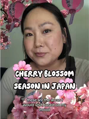A woman with dark hair poses with a smiling expression, framed by cherry blossom branches and hanging pink lanterns. Text overlays state "CHERRY BLOSSOM SEASON IN JAPAN" and "these are the areas I would visit based on my mood."