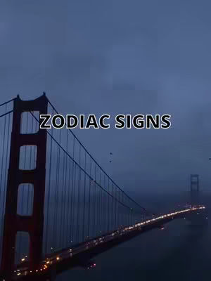 An overcast image of the Golden Gate Bridge in San Francisco with the bridge's tower on the left and the roadway stretching towards the right. Text overlayed across the bridge spells out 'ZODIAC SIGNS'.
