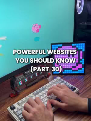 The image shows a desk setup with a computer monitor displaying a teal background with a Kirby character sticker. In front of the monitor is a white keyboard with the creator's hands typing on it. Additional elements include a digital clock, a side monitor displaying a pixelated graphic, and the text overlayed.
