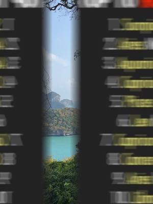 A scenic image is bisected vertically, with a blurred, dark grey or black band running through the middle. On either side of this band, the image shows a view of a sea, turquoise water, and green-covered mountains. Branches of a tree are silhouetted at the top of the frame, and the sky is a light gradient of blue.
