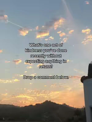 A scenic shot of a sunset sky filled with clouds. Text overlays are placed on the image, with a question regarding kindness in the center and a call to action at the bottom.