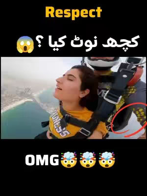 A woman is seen mid-air, likely skydiving or base jumping, attached to a harness and a partner. The sky is visible in the background, and there's text overlayed on the image.