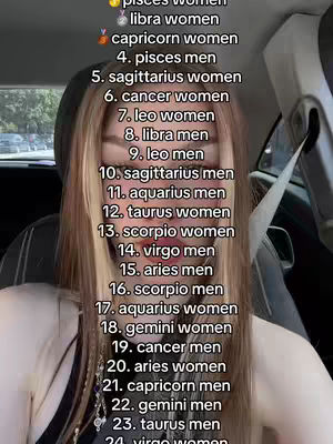 A woman is shown in the driver's seat of a car, facing towards the camera. She is blonde and has long hair. Text overlays are visible with lists of zodiac signs.