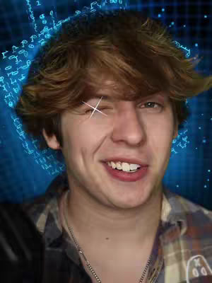 A young man with light brown hair, wearing a plaid shirt and a silver chain, winks with one eye. A shiny star is overlaid on his winking eye. The background is a blurry dark blue with digital lines that look like code.