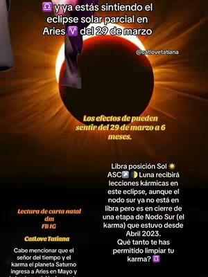 The image shows an astrological themed graphic with a dark background and a partial solar eclipse illustration dominating the center where a dark brown circle overlaps a bright yellow sun. The words are in spanish and discuss the effects of the eclipse on Aries and Libra with an overlay on the lower-left corner with social media handles.