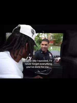 The cover image depicts a scene inside a car. One person is seen from the back, wearing a white cap and a white shirt, while a police officer is seen smiling. Text overlayed on the image reads: If one day I succeed, I'll never forget everything you've done for me...