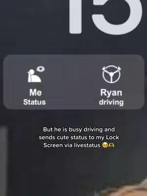 The image shows a lock screen interface from a phone, displaying status updates for two people. The screen is dark with white text and icons, and shows a status for the user ('Me') and indicates that 'Ryan' is driving. The text suggests the updates are sent via the Livestatus app, promoting a sense of connection and communication between the two individuals.