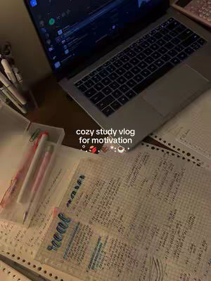 The cover image shows a desktop with a laptop, papers, and writing utensils. The laptop screen is on, and papers with handwritten notes are spread on the surface. A pen holder and other stationery items are on the left. The overall feel is organized and focused, with warm lighting.
