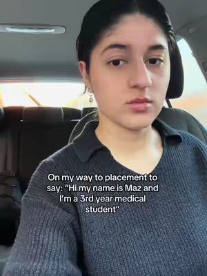 The cover image shows a woman in a car, shot from a medium angle. She is looking at the camera with a neutral expression. The background is the interior of the car, visible are the seats. In the foreground, a text overlay describes the context: she introduces herself. The color palette is muted, consisting of neutral tones from the car interior and the woman's attire.