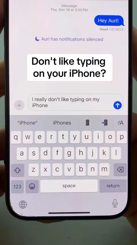 The cover image displays a smartphone screen with an open iMessage conversation. At the top, it shows the recipient's name 'Auri' and the date/time. A text bubble reads 'Hey Auri!', and a subsequent message reads 'Don't like typing on your iPhone?' below it. The bottom part of the screen shows the iPhone keyboard with the keys visible. A white text box is at the top labeled "Don't like typing on your iPhone?"