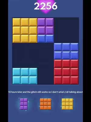 The cover image shows a game screen of a block puzzle. Various colored block shapes are arranged within a grid. Above the grid, a heart-shaped emblem has the number 2256 inside. Below the game grid, there are previews of blocks. The background is a deep blue. At the bottom of the screen, text claims, '13 hours later and the glitch still works so I don't what y'all talking about'.