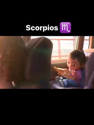 The cover image features a scene from an animated film. In the foreground, a young girl with brown skin and dark hair sits in a car seat, seemingly focused on a device in her hands. Behind her, an adult figure is partially visible, suggesting a parent or guardian is present. The background shows the inside of a vehicle, including seats and a window with an out-of-focus view, hinting at a moving car or bus.
