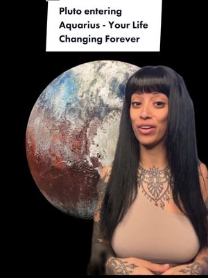A woman with long dark hair stands in front of a stylized image of the planet Pluto against a black background. Text in a white box at the top of the image reads, "Pluto entering Aquarius - Your Life Changing Forever."