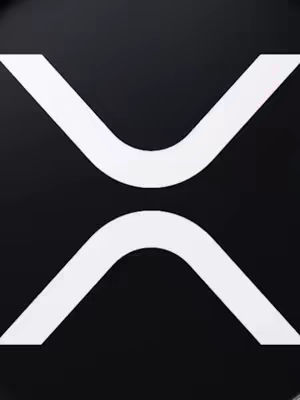 The cover image features the XRP symbol, a stylized representation of the cryptocurrency, prominently displayed against a black background. The symbol appears as a white, abstract design with two inverted chevrons that meet in the center.
