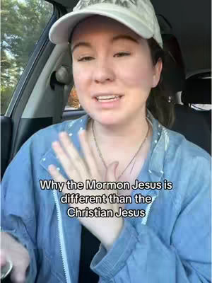 A woman is seated in a car, facing the camera with a slightly surprised expression. She's wearing a light-colored baseball cap and a blue collared shirt. The image is well-lit, focusing on her face and upper body, with the car's interior visible in the background. The title text is in the bottom center "Why the Mormon Jesus is different than the Christian Jesus"