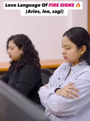 The cover image shows two women in a professional setting. The woman on the right has her arms crossed. Above the image is the text 'Love Language Of FIRE SIGNS (Aries, leo, sagi)'