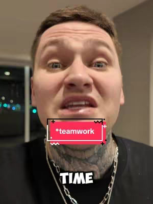 A close-up shot of a man with short dark hair and a partially tattooed neck. He's wearing a black shirt and a silver chain necklace. A red box with the text '*teamwork*' is overlaid on his mouth, and the word 'TIME' is below his neck.