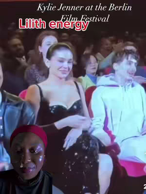The image shows Kylie Jenner at the Berlin Film Festival. The overlay text says "Lilith energy". A person with face glitter in front of the camera.