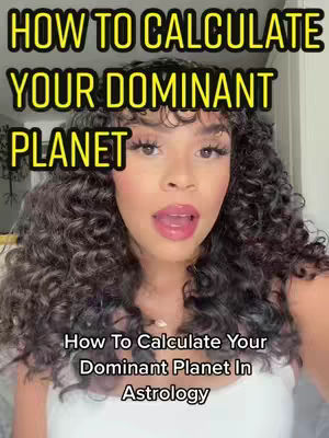 A woman with long, curly hair is shown from the chest up, with text overlays. The background appears to be an indoor setting. The woman is looking at the camera with her mouth open, as though speaking, and she is wearing a white top and a necklace. Overlayed text is in a bold, yellow font above her head and white font at the bottom.