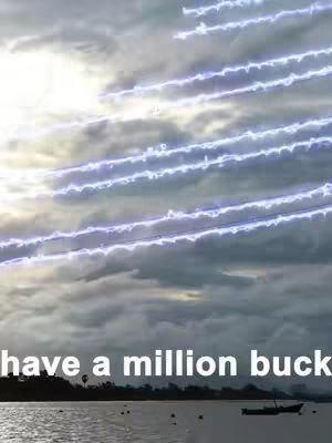 The cover image showcases a cloudy sky with several parallel, glowing blue lines that appear to be energy flows. Below, a body of water meets a distant shoreline where a small boat is visible. Text overlayed on the image reads, 'have a million buck'.