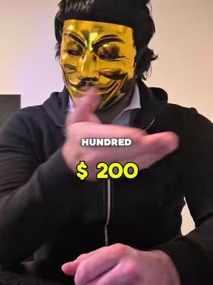 A person wearing a golden mask in front of a black background, with the words "HUNDRED $200" overlayed on the image.