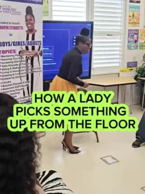 A woman in a black top and yellow skirt demonstrates how to pick something up from the floor during a public speaking engagement. The image is overlaid with text in a green rectangle.