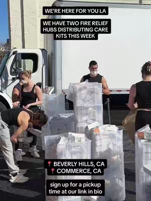 The cover image shows a group of people distributing care kits. The scene is set outdoors with a white truck in the background. The people are interacting by the truck, loading and unloading supplies. Text overlays convey key information about the event, with locations and a call to action.