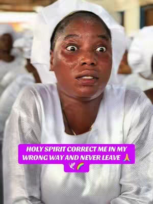 A medium shot captures a Black woman with wide, surprised eyes and an open mouth, her expression conveying shock. She wears a white head covering and a white top, with other individuals blurred in the background. A text overlay in a purple box reads, "HOLY SPIRIT CORRECT ME IN MY WRONG WAY AND NEVER LEAVE" accompanied by a dove and rainbow symbol.
