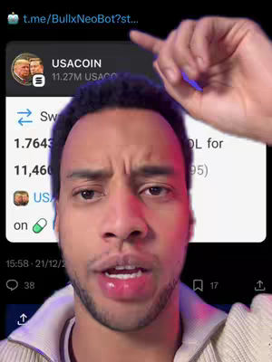 A close-up shot of a man with dark hair and a concerned expression. He's looking directly at the camera with slightly open lips. A hand is pointing towards a screen displaying crypto-related data.