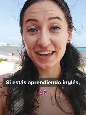 A woman smiles toward the camera in a selfie. Text overlays the image at the bottom. The background is a beach, with trees, water, and blue skies.