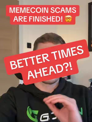 The cover image features a man in a black hoodie in front of a neutral background. Two red banners with white text overlay his face. The top banner reads 'MEMECOIN SCAMS ARE FINISHED!'. The man's face cannot be seen. The bottom banner reads 'BETTER TIMES AHEAD?!'.
